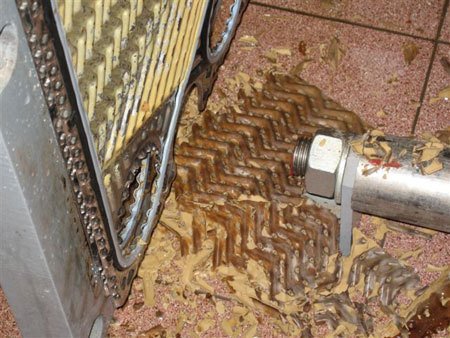 Nuimtas kalkinis sluoksnis šilumokaityje